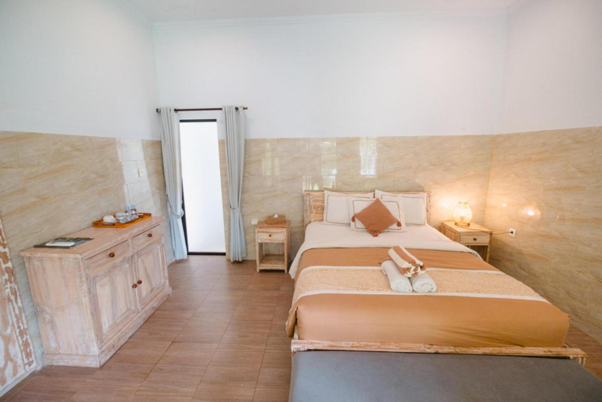 Agung Wiwin Homestay & Restaurant Mengwi Екстериор снимка